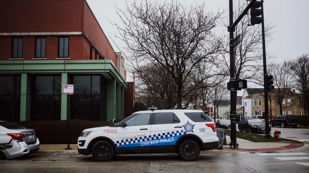 police car outside municipal building