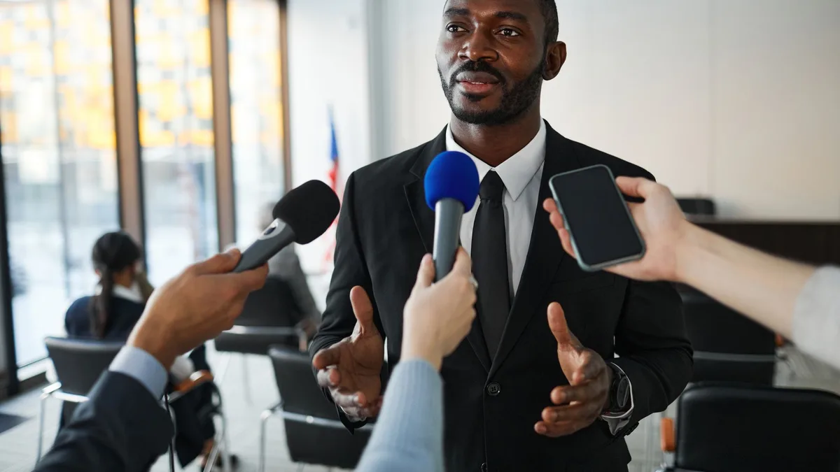 business executive speaking on television interview